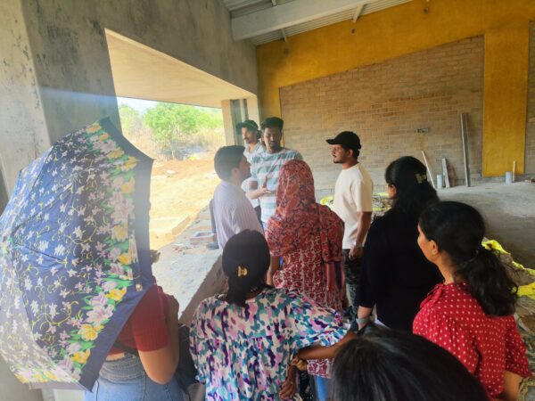 Lawrence guiding us through the site