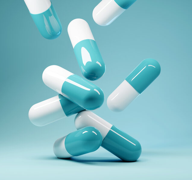 pills over blue background