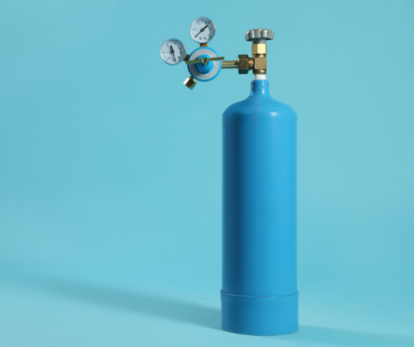 Blue medical oxygen tank over light blue background